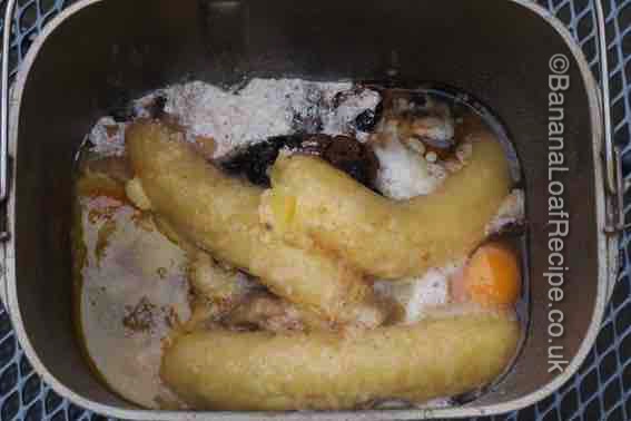 Banana loaf ingredients in breadmaker bucket