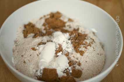 banana loaf cake dry ingredients - flour, baking powder and sugar